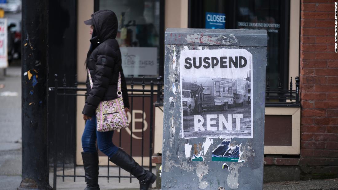 Mandatory Credit: Photo by STEPHEN BRASHEAR/EPA-EFE/Shutterstock (10595051d) A sign calling for the suspension of rent during the COVID-19 outbreak is pictured in downtown Seattle, Washington, USA, 26 March 2020. Unemployment claims in the area have shot up recently as the economy had ground to a halt. Washington State Response to COVID-19, Shoreline, USA - 26 Mar 2020