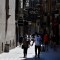 People walk down a shopping street in Lleida on July 4, 2020. - Spain's northeastern Catalonia region locked down an area with around 200,000 residents around the town of Lerida following a surge in cases of the new coronavirus. (Photo by Pau BARRENA / AFP) (Photo by PAU BARRENA/AFP via Getty Images)