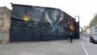 Artista urbano realiza mural a favor de la paz y así luce