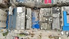 Derrumbe de edificio en China deja número desconocido de personas atrapadas
